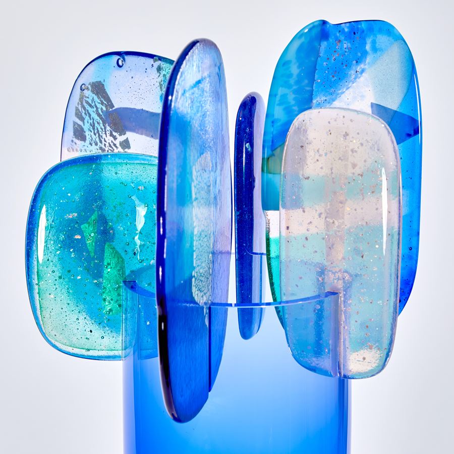 bright blue and pink abstract lollipop style sculpture handmade from glass