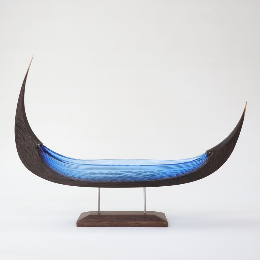 aqua blue viking ship with textured hull handmade from glass and oak