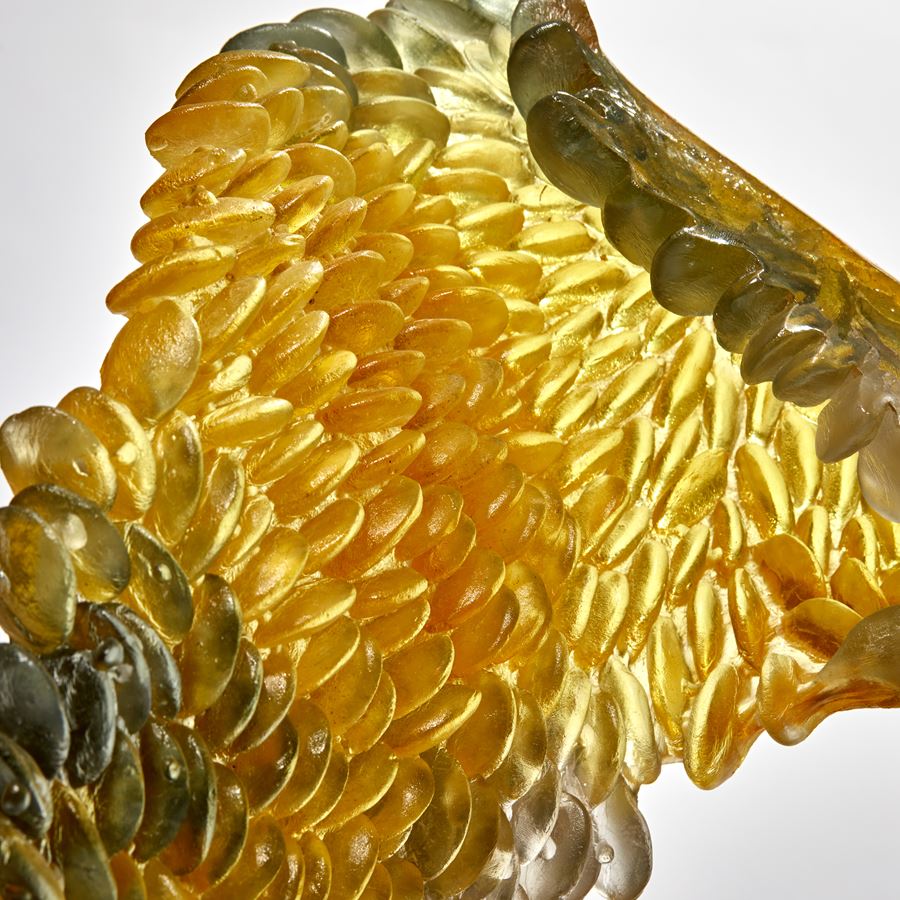 yellow and grey twisted loop formed textural sculpture handmade from cast glass