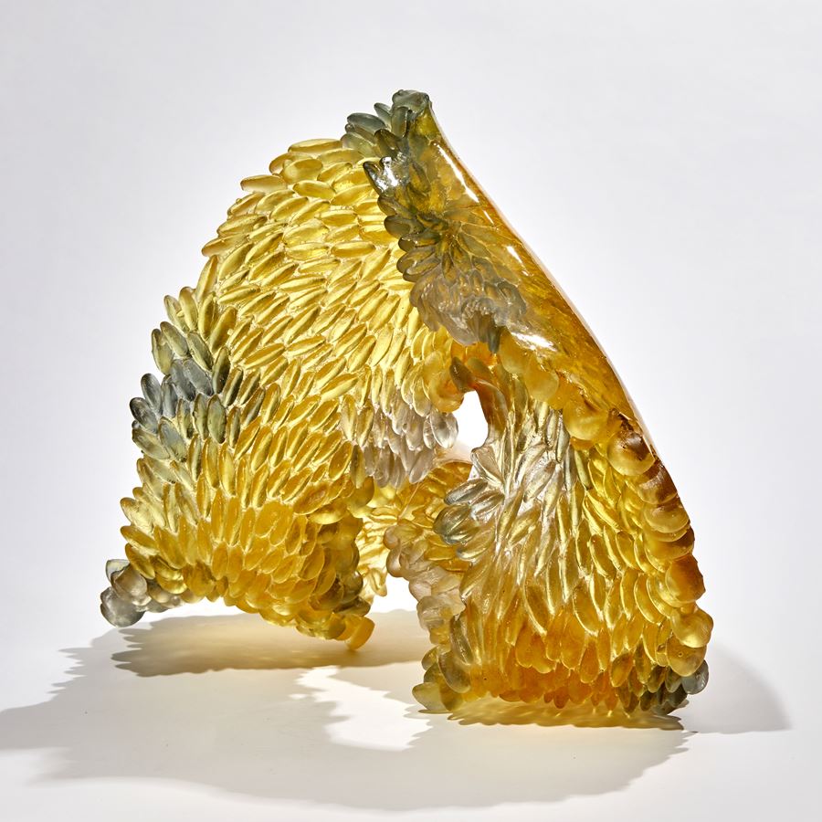 yellow and grey twisted loop formed textural sculpture handmade from cast glass