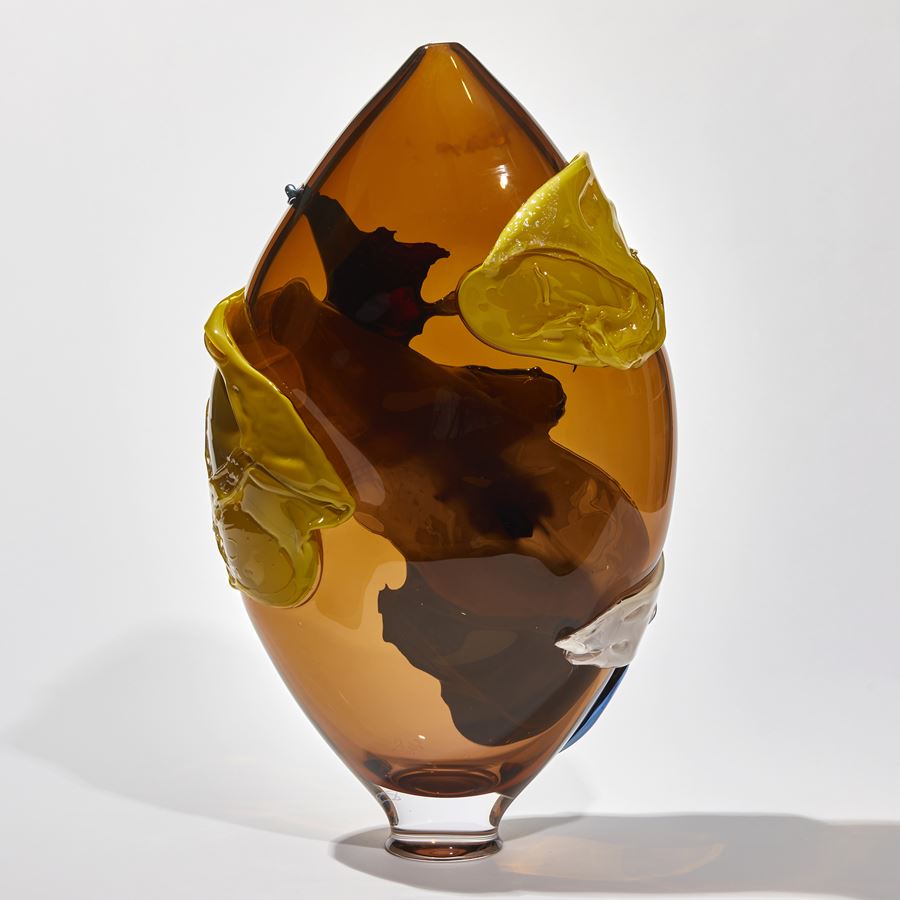 tobacco yellow and blue shiny abstract pointed oval shaped sculptural vessel handmade from glass
