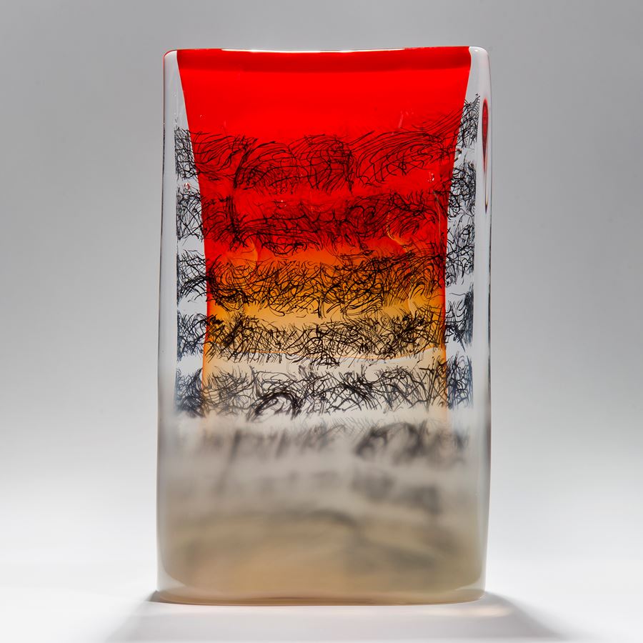 red black clear and taupe rectangular solid glass manuscript tablet sculpture with erratic scribbled black lines
