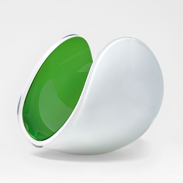 white and apple green glossy contemporary rounded art-glass sculpture made from blown and cut glass