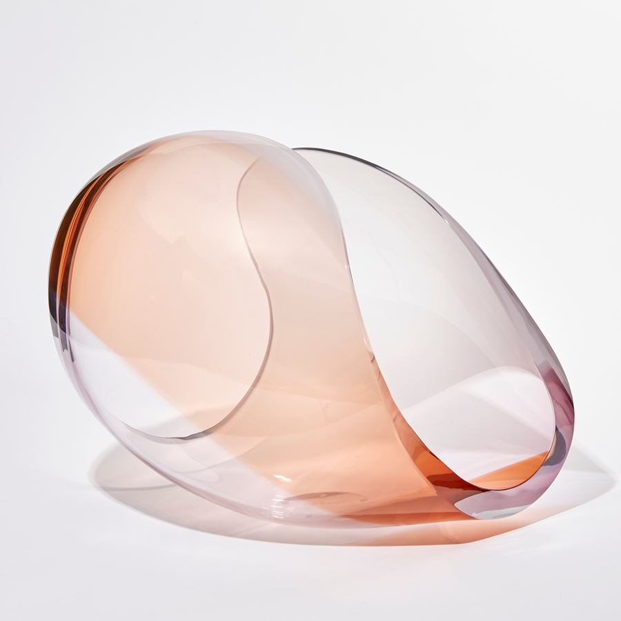 transparent peach and light pink sleek conch shell sculpture handmade from glass