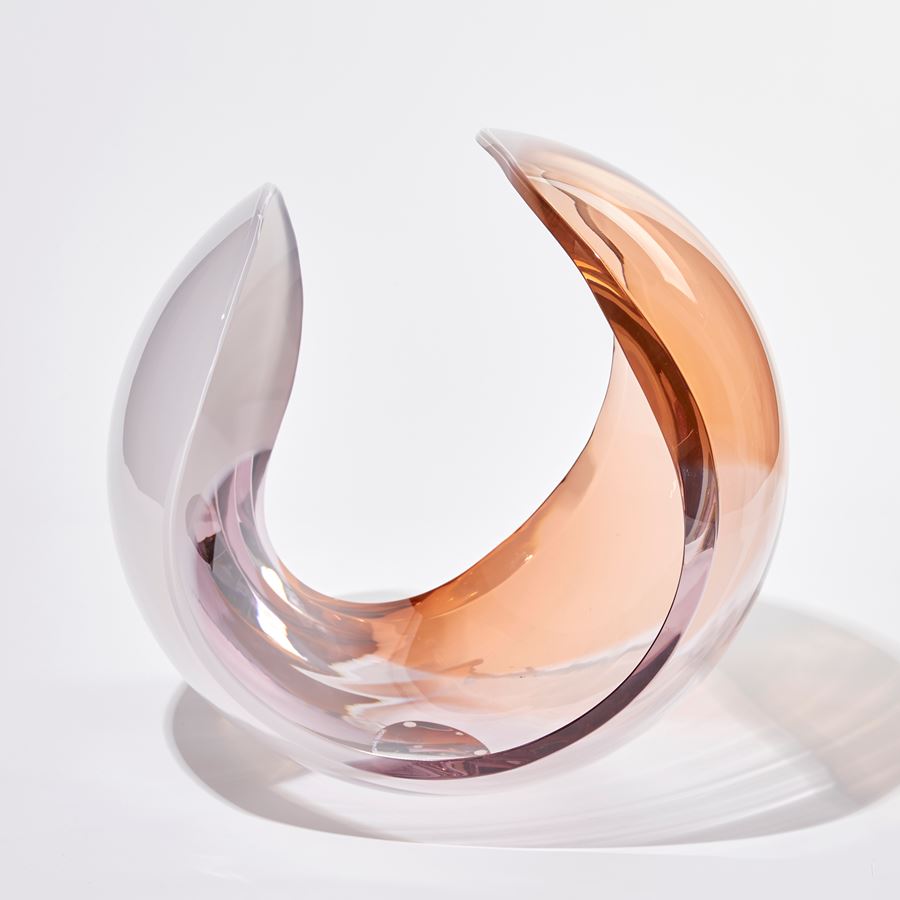 transparent peach and light pink sleek conch shell sculpture handmade from glass