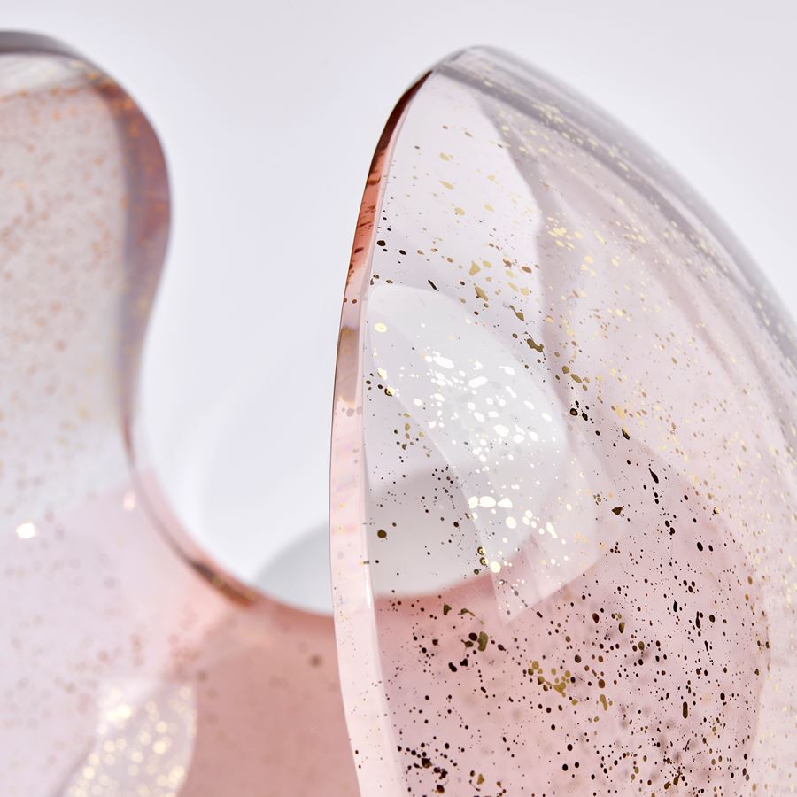 Transparent pink simplified conch shell shaped handcrafted glass sculpture with gold speckles
