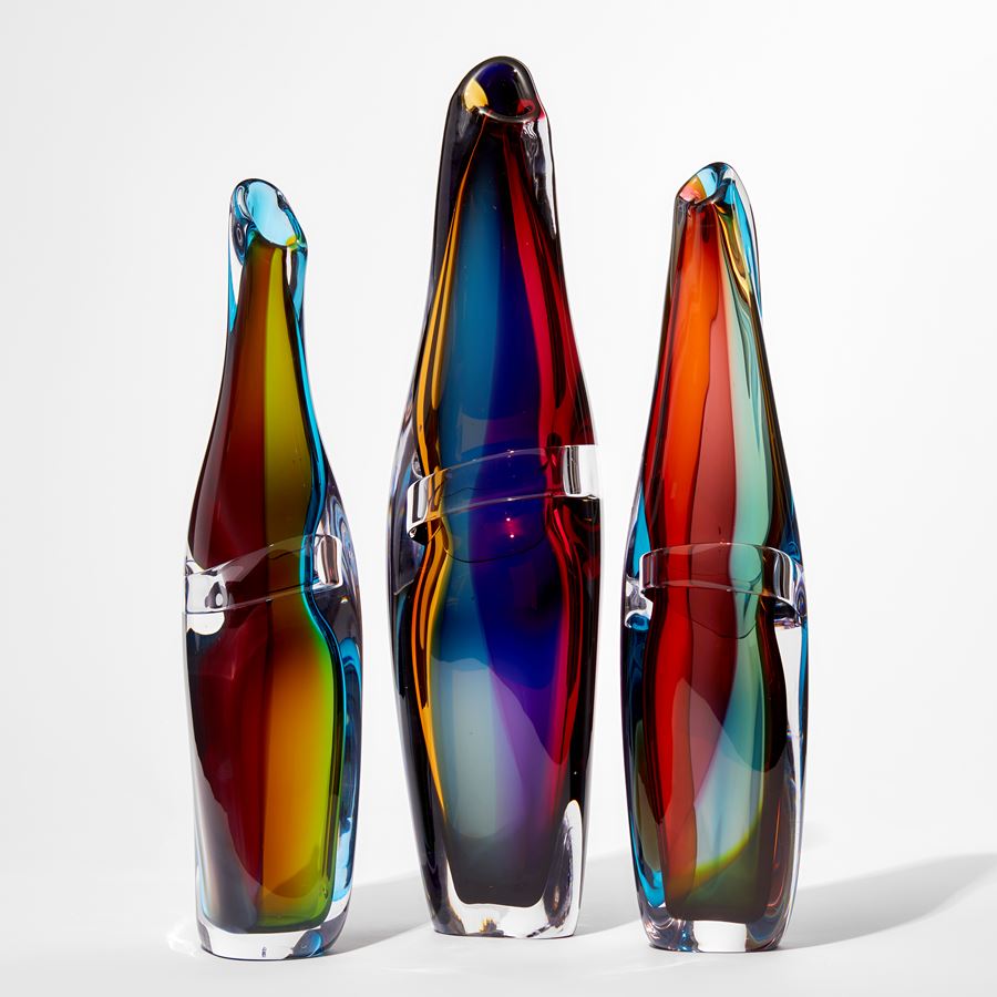 tall amorphic multicoloured glass sculptural vessel with a soft organic and fluid shape