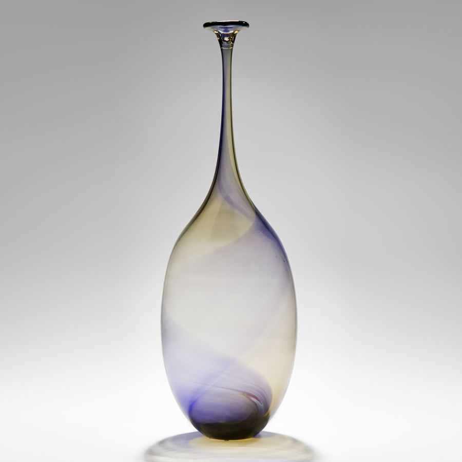 purple and ochre tall necked transparent bulbous bottle handmade from glass