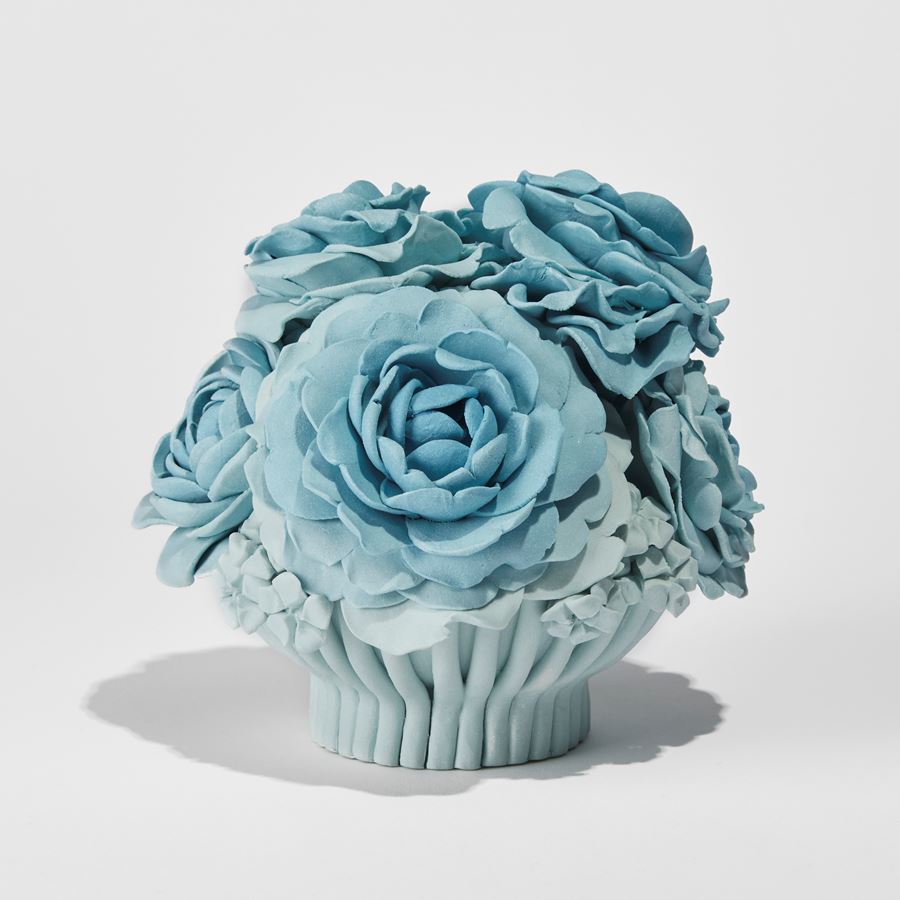 dusky light blue garland of roses and flowers handmade from porcelain