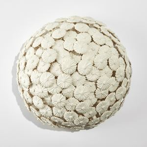 cream domed wall mounted sculpture covered in handmade porcelain flowers