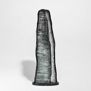 Tall geode inspired grey black and clear glass handmade sculpture with texture crystal detailed interior
