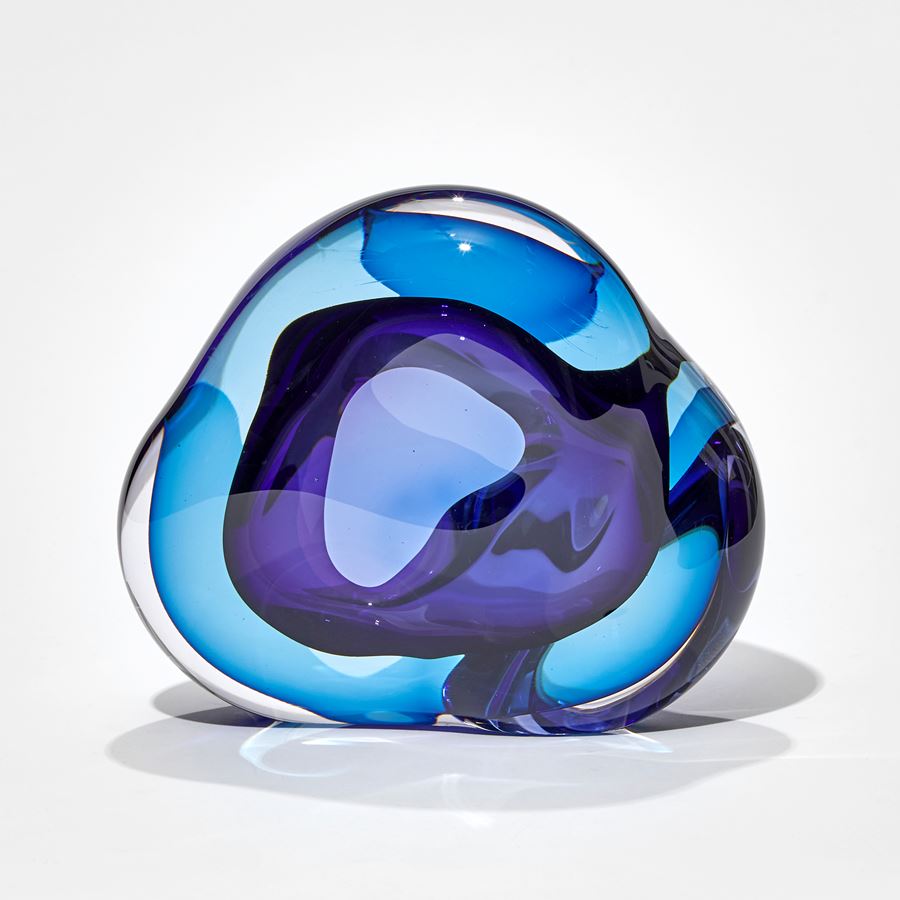turquoise and purple soft blob sculpture hand made from glass with central cavity