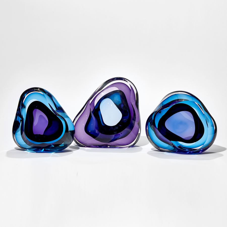 turquoise and purple soft blob sculpture hand made from glass with central cavity