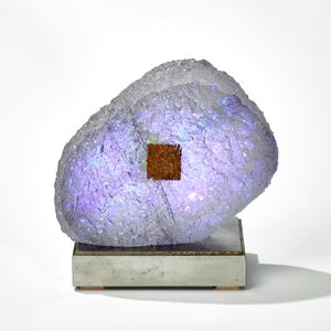 lilac purple and grey rock sculpture on a square steel base hand made from glass