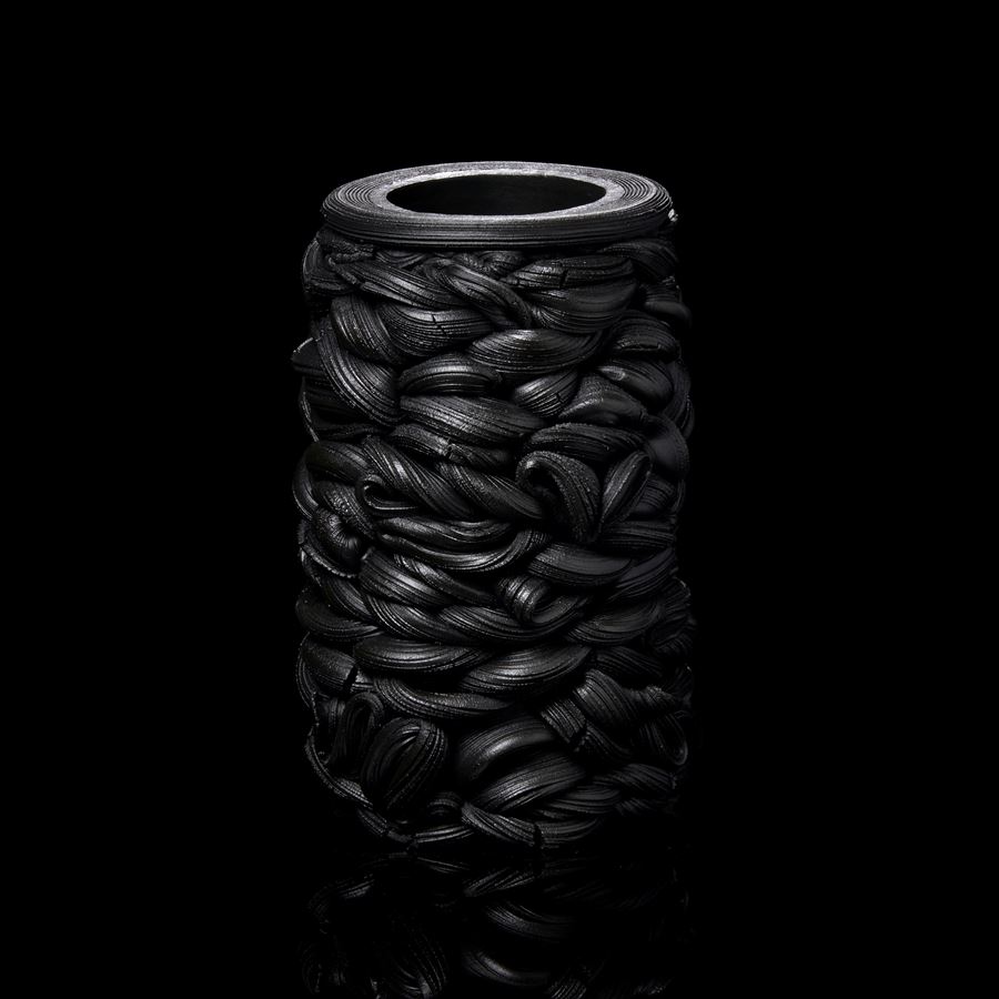 black liquorice stacked interwoven vessel handmade from clay 