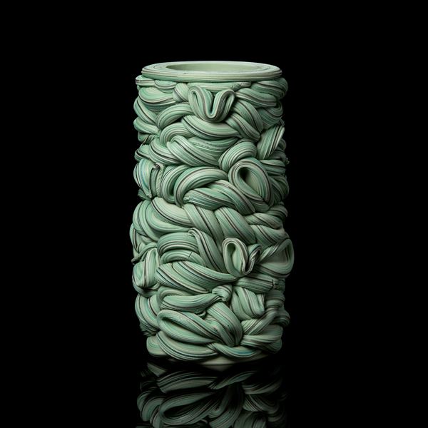 writhing green abstract snakes interwoven vessel handmade from parian porcelain