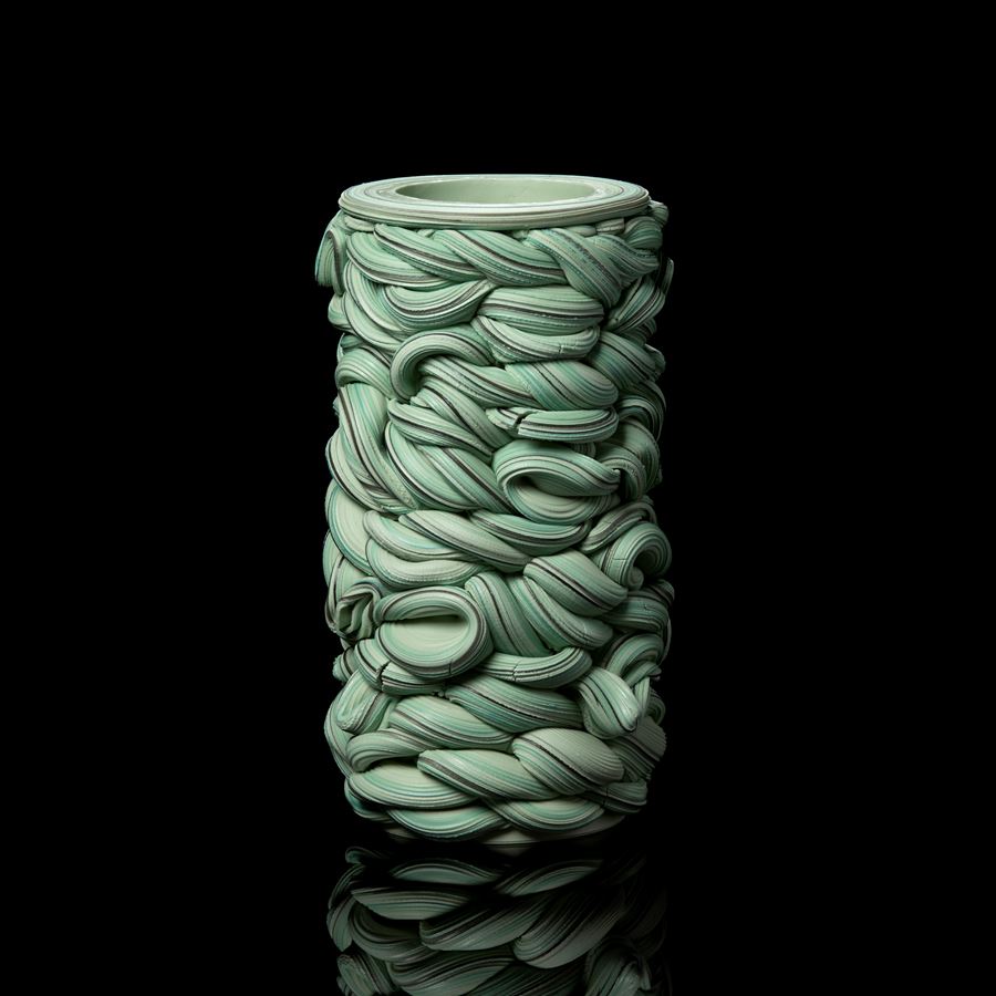 writhing green abstract snakes interwoven vessel handmade from parian porcelain