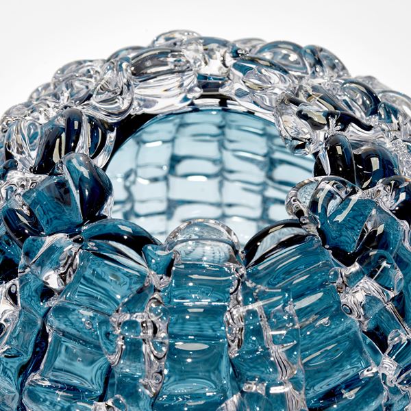 aqua blue echinus inspired round hand blown glass vase with rippled surface