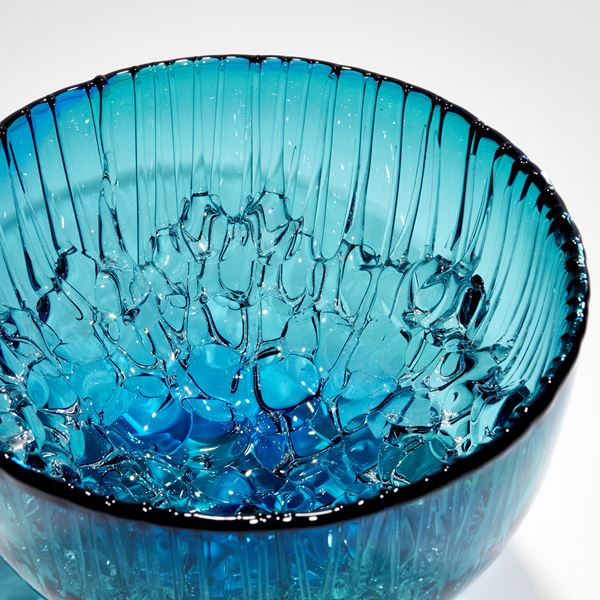 blue and green rounded based bowl with dribbled inside hand made from glass