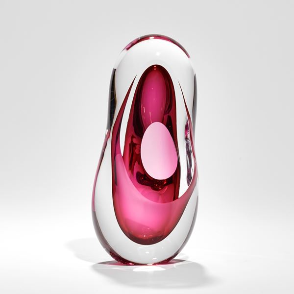 clear and pink amorphous tall soft and rounded sculpture hand made from blown glass