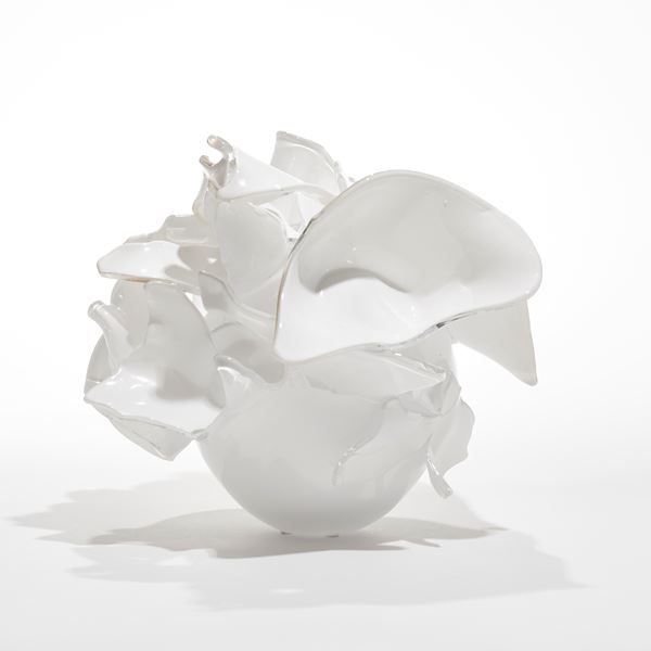 opaque white abstract floral sculpture with petals made from cut open bubbles hand made from glass