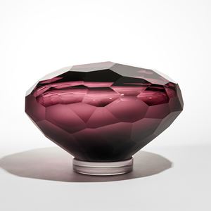 abstract mushroom shaped facetted sculpture in rich red purple hand made from glass