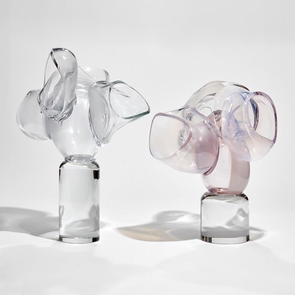 abstract soft tree and human heart inspired sculpture with column trunk and squished bubbles on top hand made from glass