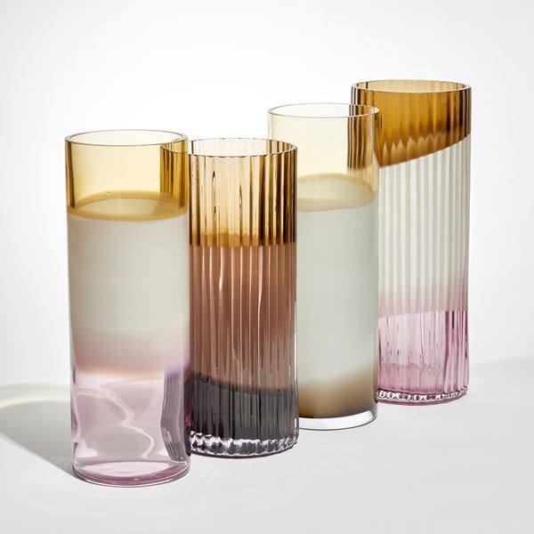 brown opaque white and pink round cylinder vase with external organic ridges hand made from glass 