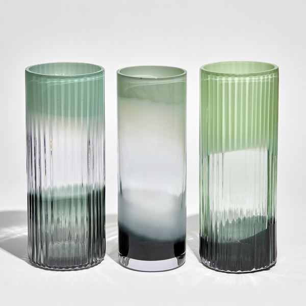 ridged cylinder vase with bands of turquoise green clear and dark greeny grey hand made from glass