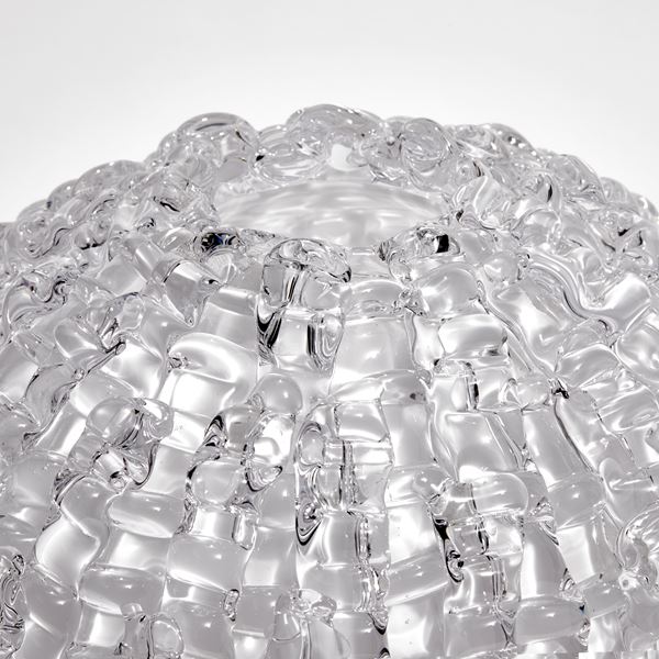 handblown spherical contemporary art glass sculpture in opaline arranged from small individual shards