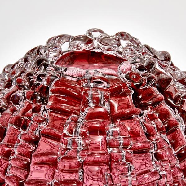 handblown spherical contemporary art glass sculpture in heliotrope arranged from small shards