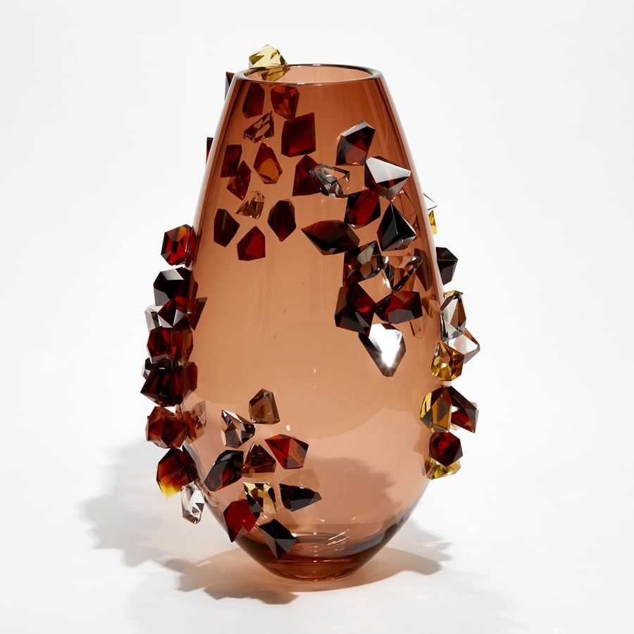 rich peachy amber teardrop shaped vase adorned with organic cut gems in dark amber and light gold hand made from blown and cut glass