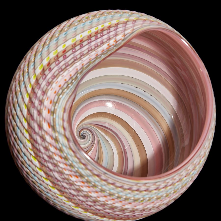 pastel coloured banded and textured abstract rounded shell inspired sculpture with matt exterior and glossy interior hand made from glass