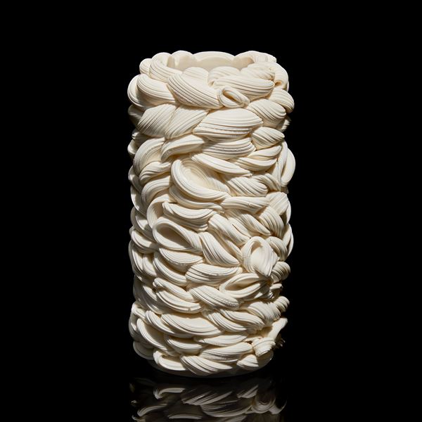 white interwoven white column vessel of folding forms hand made from parian porcelain