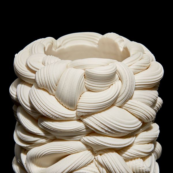 white interwoven white column vessel of folding forms hand made from parian porcelain