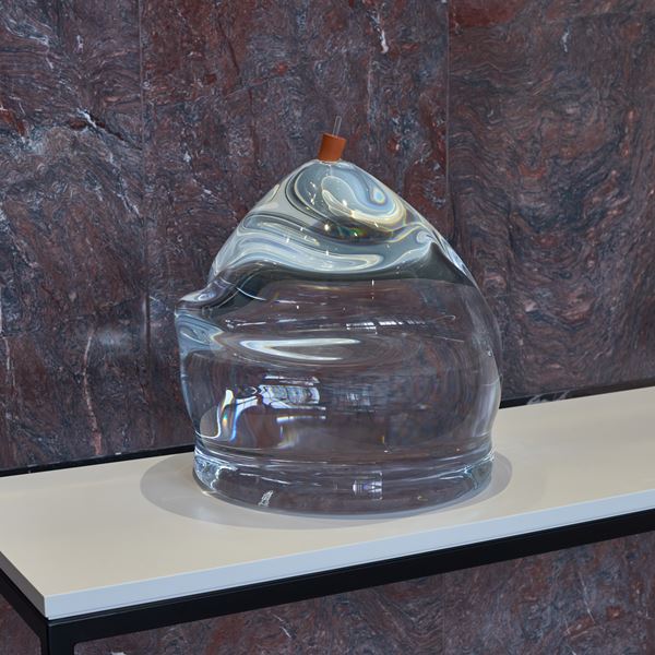 six amorphic huge handblown glass forms with rippling surfaces filled with distilled water which distorts the view through each one like a lense
