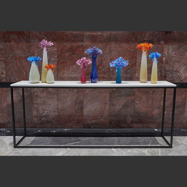 tall pop art hand made glass tree with alabaster coloured smooth trunk and candy coloured blue rounded mass of leaves on top