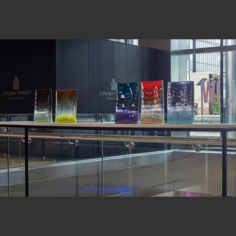 Rectangular standing glass sculpture in purple blue and clear glass with encased scribbled black lines