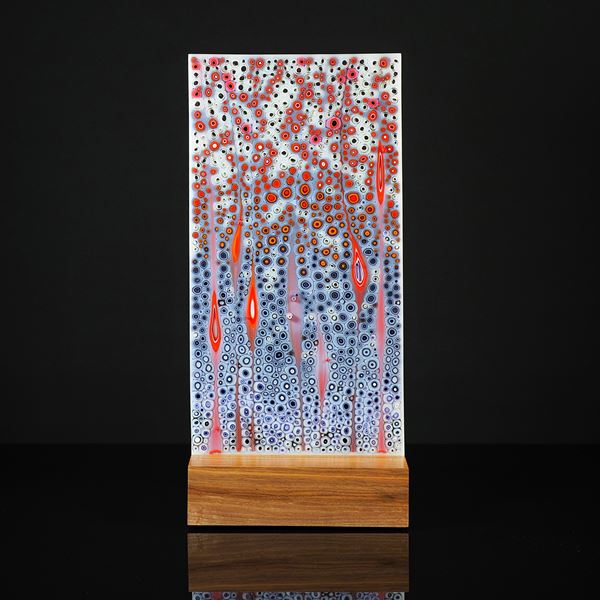 tall rectangular panel with organic detail that is a multitude of small dots and grass head shapes in blue purple white and red hand made from glass with wood base 