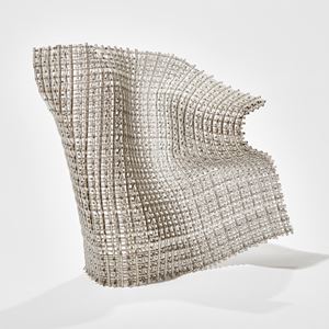 woven standing abstract offset form with the appearance of flexing cloth handmade from glass canes