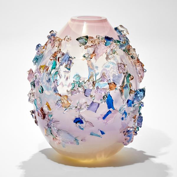 round oval pastel coloured glass vase covered in organic shards of glass in blue pink purple and jade hues