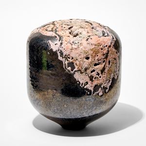 round tubular form with tapered base with metallic aged finish and lava textured organic raised pink detail hand made from glass