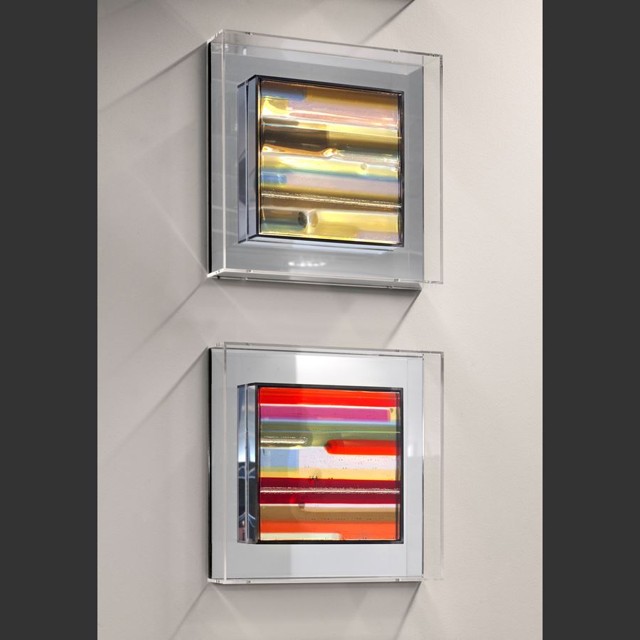 modern glass wall art in minimalist line colours in acrylic box