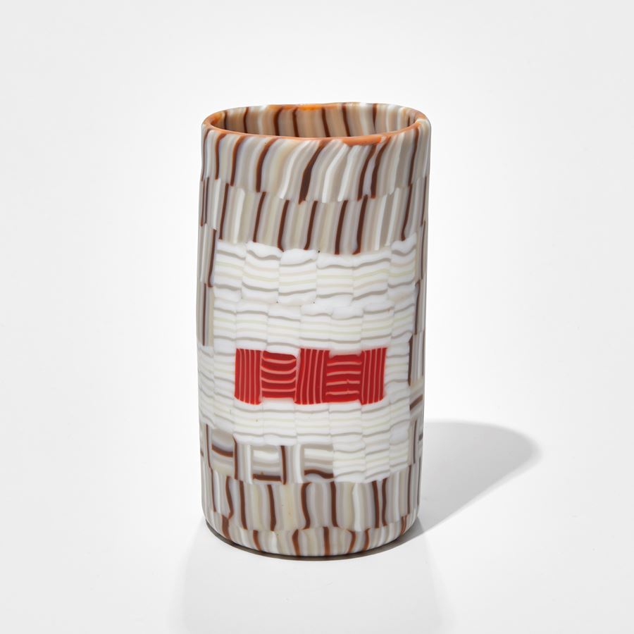 short squat cylinder vase with abstract mosaic design in cream brown red and white hand made from glass