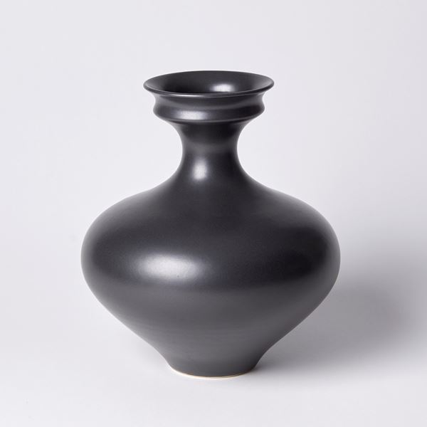 squat low wide rounded black vase with double rim detail hand thrown from porcelain