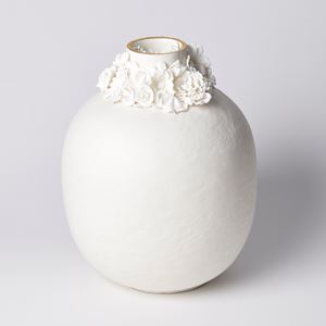 rounded jar with slightly uneven surface and floral ring around the opening with gold lustre band hand made from porcelain and parian