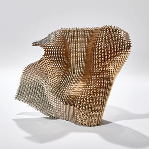 hand made undulating standing abstract woven form created from glass canes with the appearance of cloth with an open weave with a fine coating of gold 