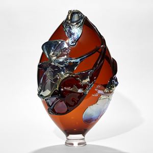 dark amber teardrop vase with metallic blue trails and raised organic detail handmade from glass