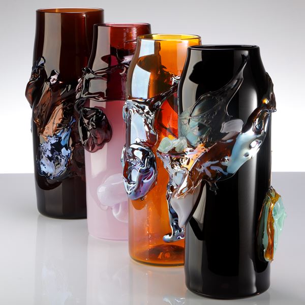 tall cylindrical vase with tapering neck with opaque lilac base blending to rich transparent dark purple aubergine with with additional surface abstract organic flourishes and textures handmade from glass