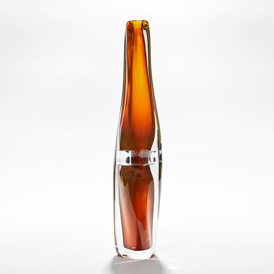 tall peach fading to amber amorphous narrow vase hand made from glass